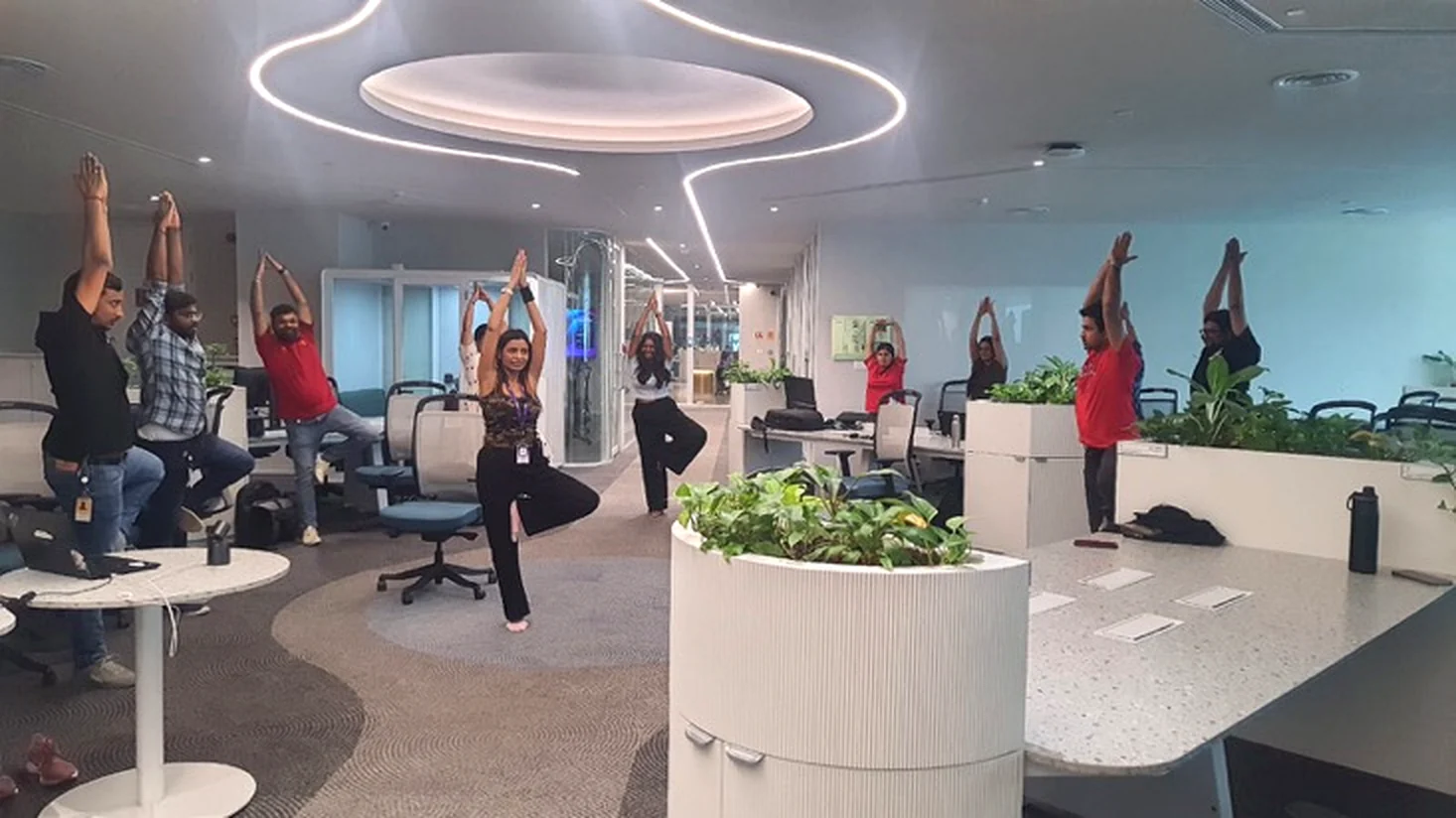 Office team practising chair yoga